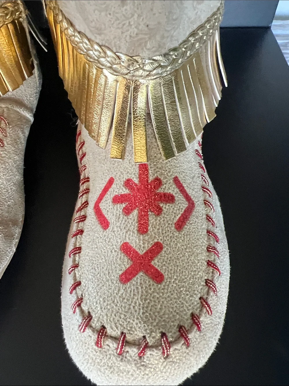 Disney Beige Moccasin Boots with Gold Fringe and Red Embroidery